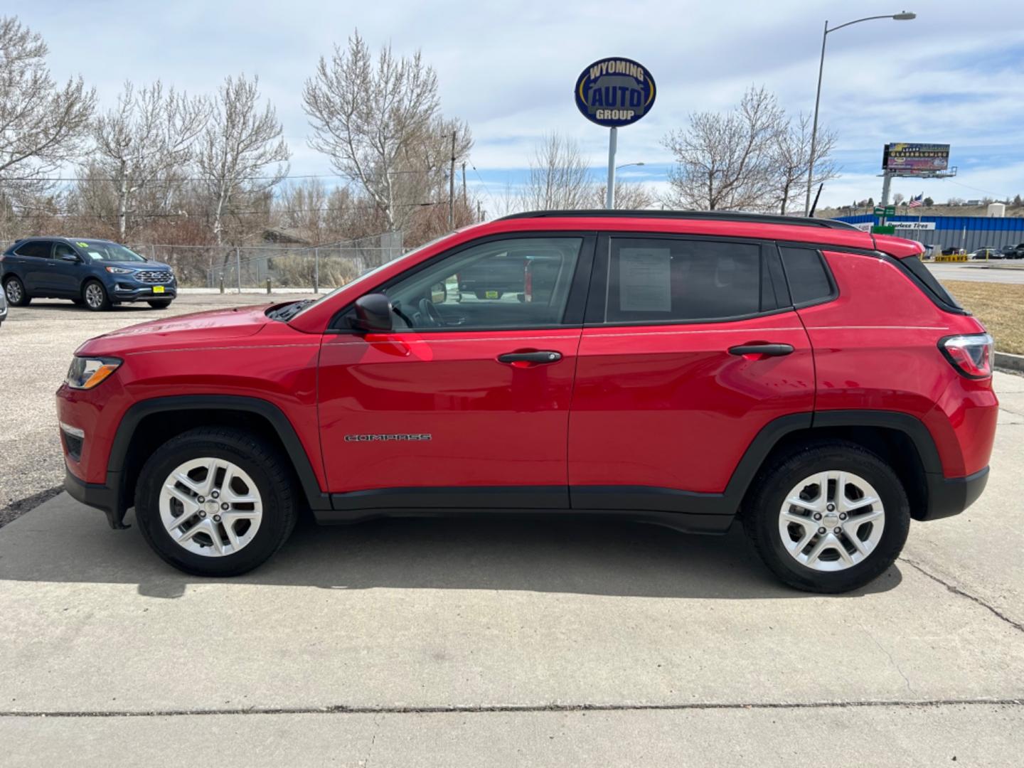 2018 RED /BLACK JEEP COMPASS SPORT (3C4NJCAB3JT) with an 2.4L engine, 6-Speed Manual transmission, located at 3030 CY Ave, Casper, WY, 82604, (307) 265-3830, 42.827816, -106.357483 - Photo#0